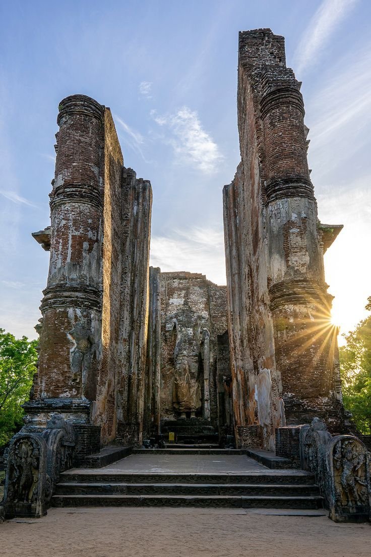 This may contain: the sun shines brightly through some ancient ruins