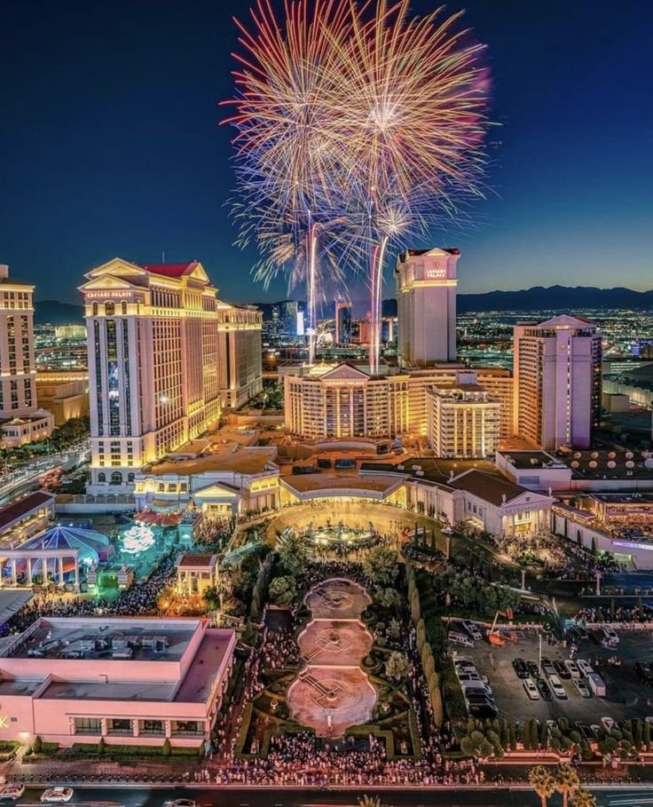 This may contain: fireworks over the las vegas strip at night with hotels and casinos in the background