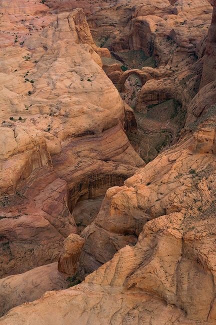 This may contain: an aerial view of canyons and cliffs in the desert