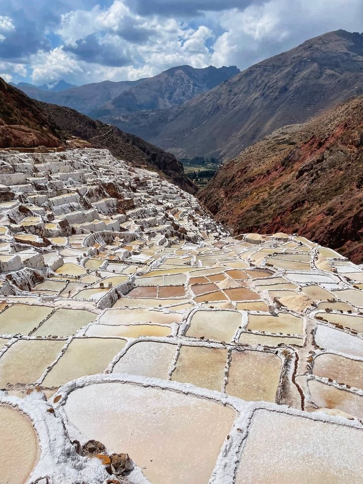 This may contain: the terraces are covered in snow and rock
