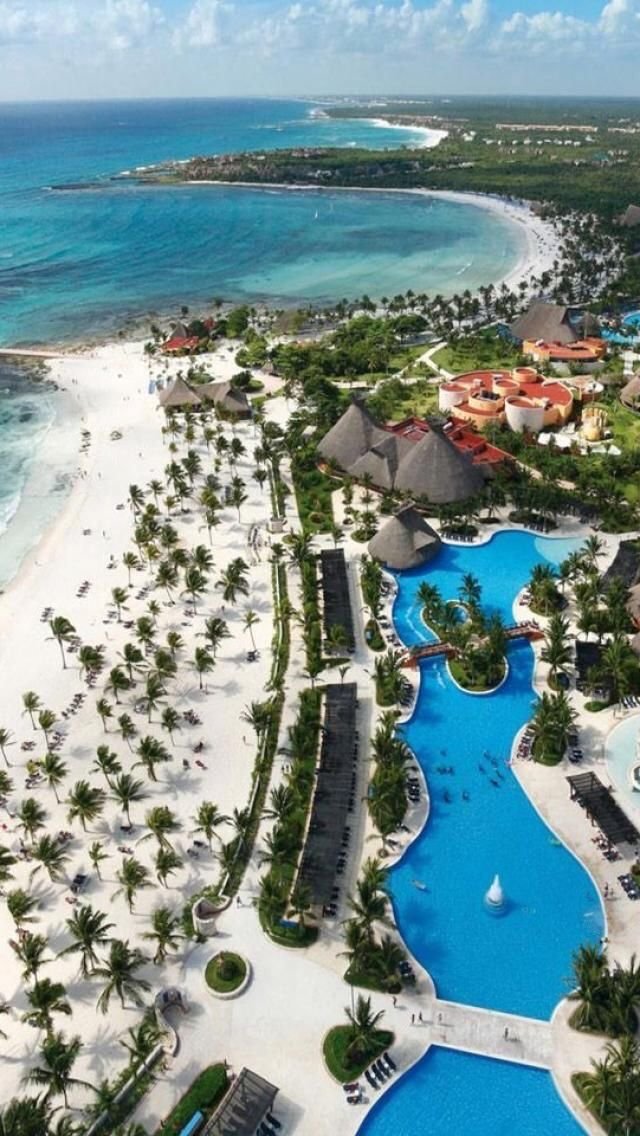 This may contain: an aerial view of the beach and lagoon at dreams resort in cancucilla, mexico