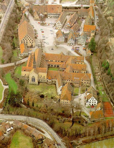 This may contain: an aerial view of a city with lots of buildings and roads in the foreground