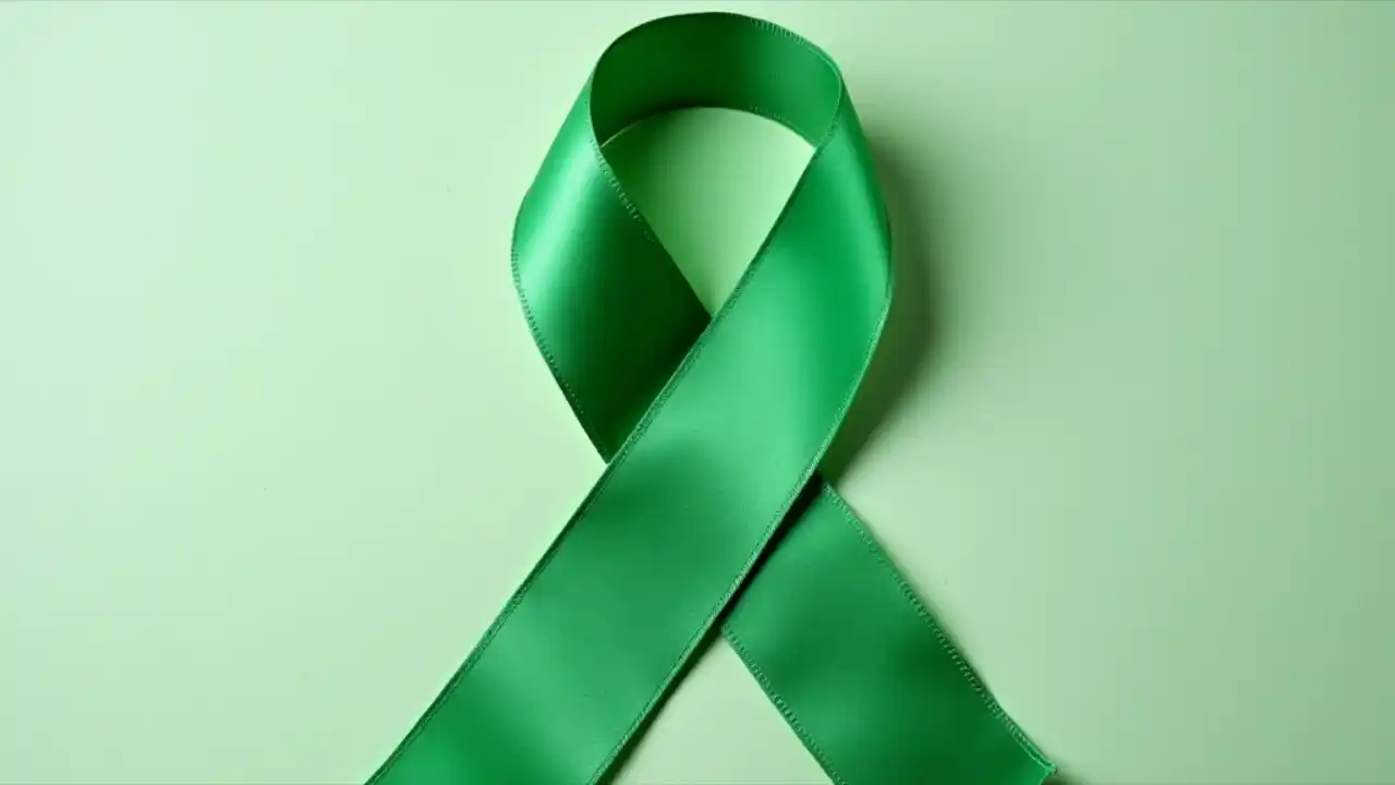 Green ribbon symbolizing National Cerebral Palsy Awareness Day