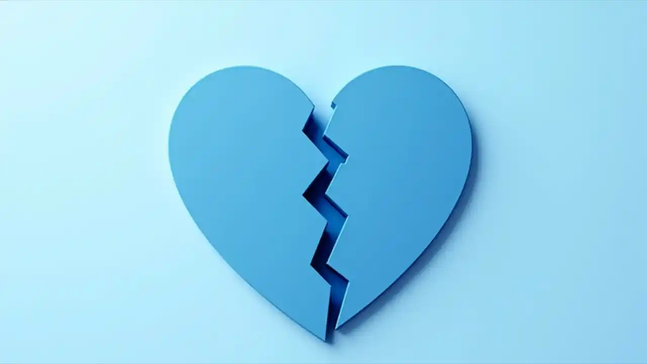 A stylized medical symbol with a broken heart icon, symbolizing awareness for erectile dysfunction and men's health, rendered in muted blue and white tones.
