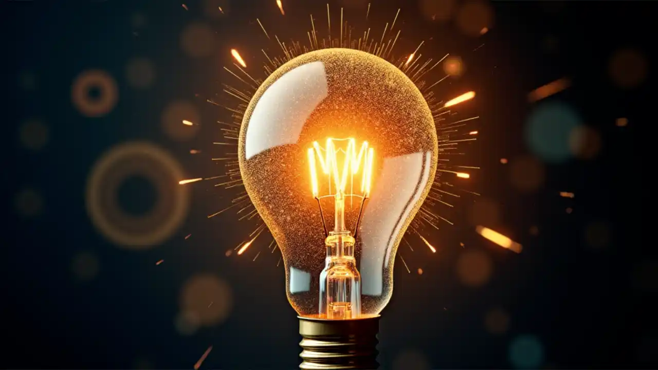 A bright light bulb illuminated with creative sparks, surrounded by gears and tools, symbolizing innovation and invention on National Inventors' Day