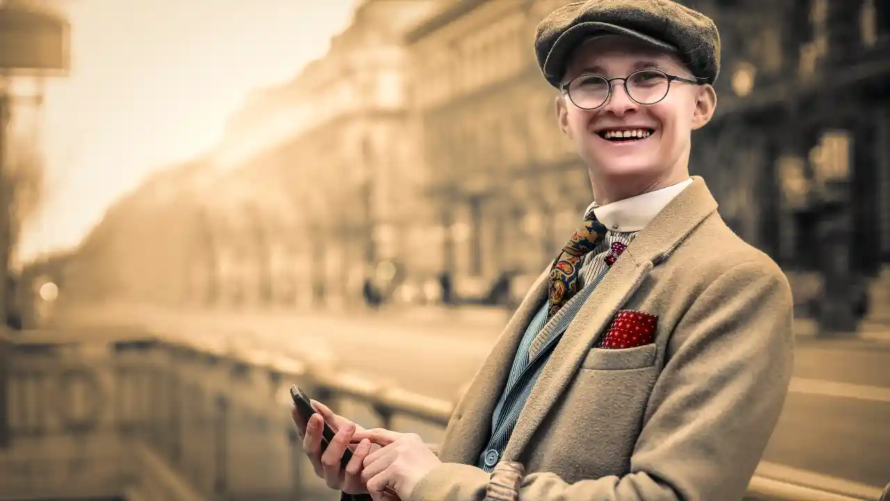 Positive guy outdoors celebrating National Tweed Day.