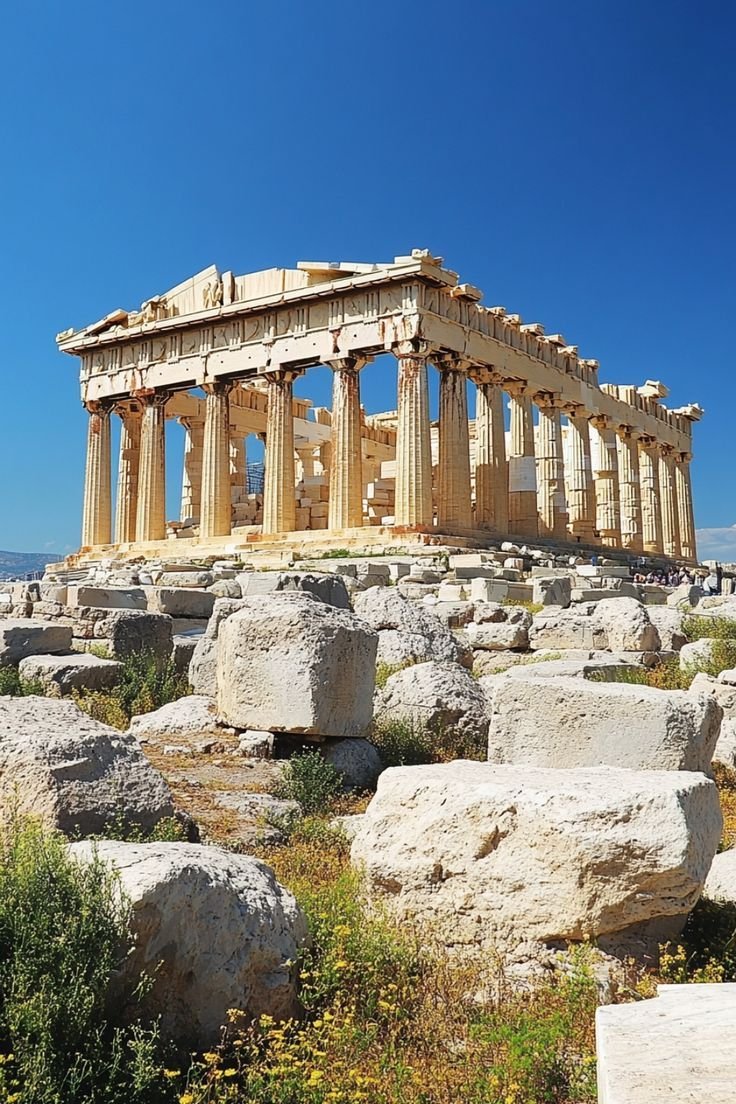 This may contain: the parthenon is one of the most famous structures in the world, and has been built on top of rocks