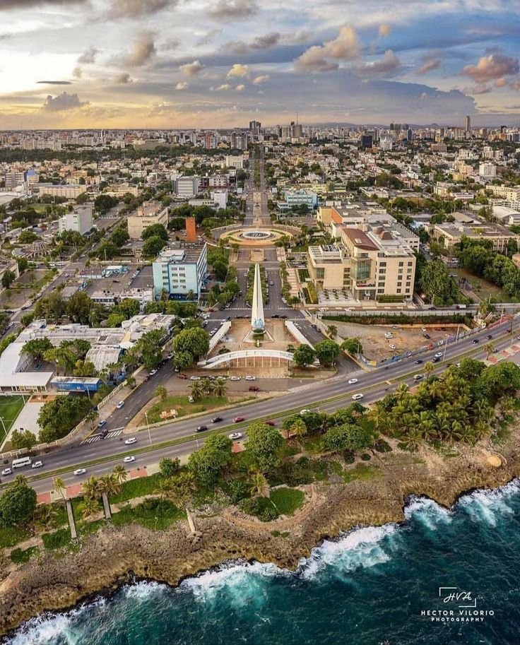 This may contain: an aerial view of the city and ocean