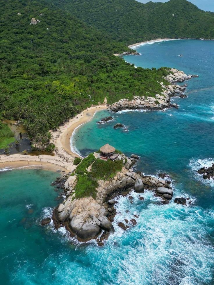 This may contain: an aerial view of the beach and ocean
