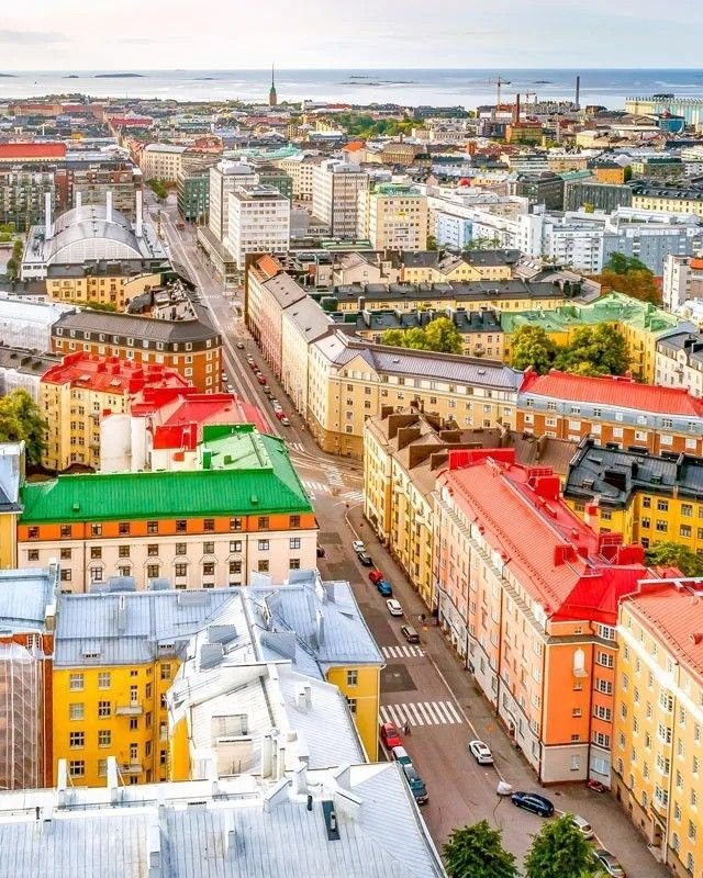 This may contain: an aerial view of a city with many buildings