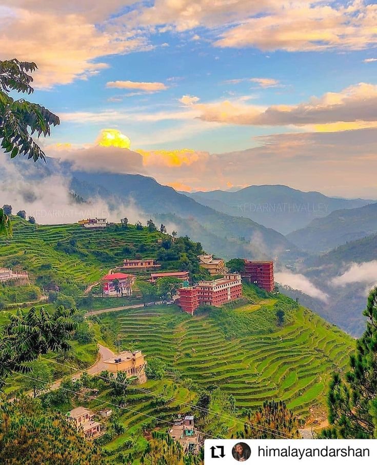 This may contain: a scenic view of the mountains and rice terraces in mu cang chay, vietnam