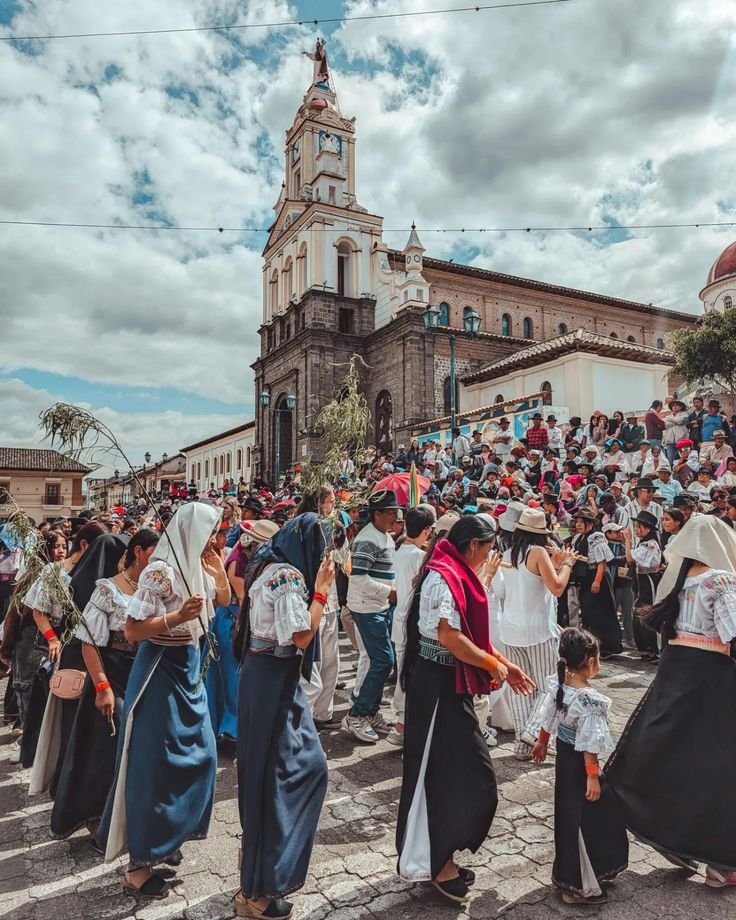 This may contain: a group of people standing in front of a church
