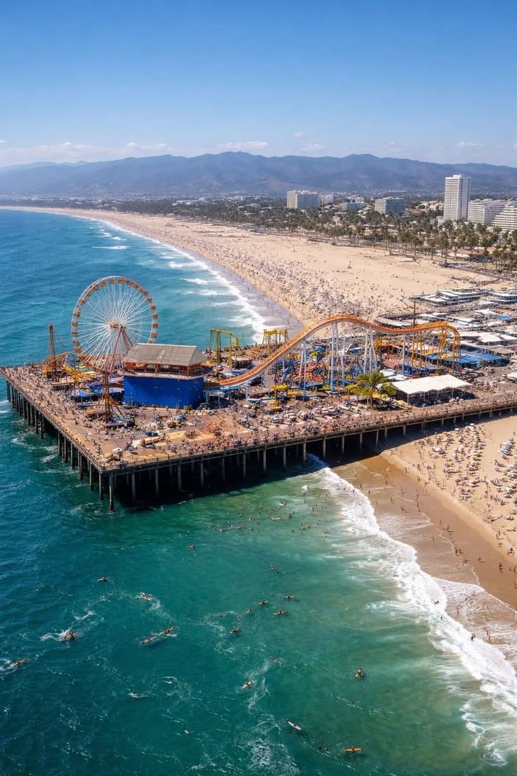 This may contain: an aerial view of the beach and pier