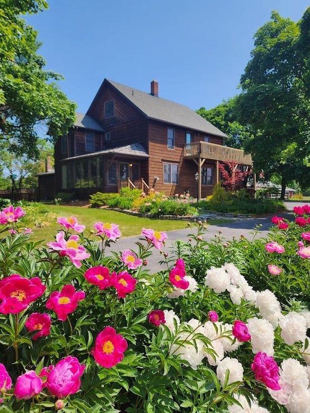 This contains: Chanticleer Guest House and garden view