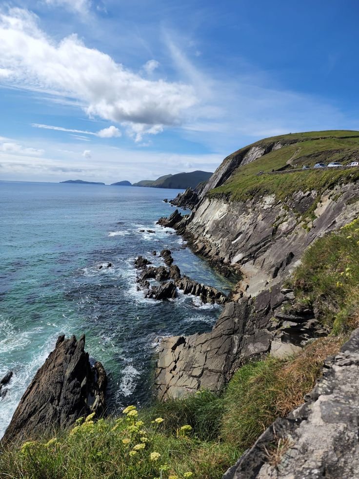 This contains: Hiking the Dunmore Head Trail in Ireland touring the Dingle peninsula