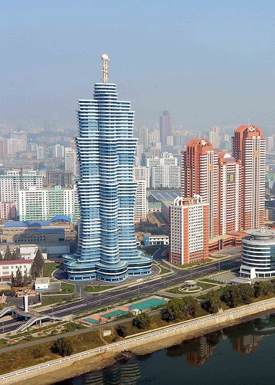 This may contain: an aerial view of a city with tall buildings