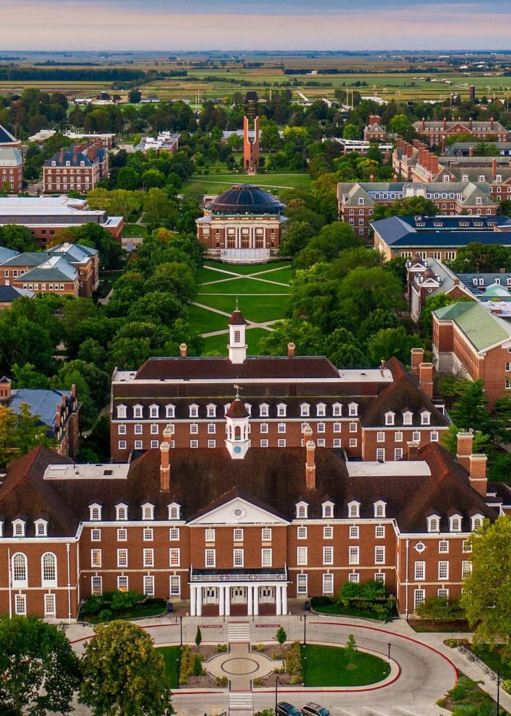 This may contain: an aerial view of the campus and surrounding buildings