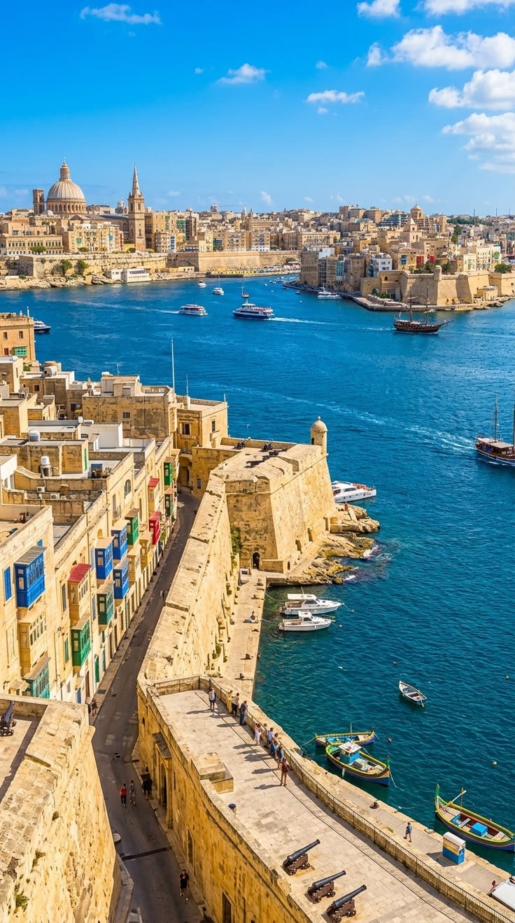 This may contain: an aerial view of the old city walls and harbor with boats on the water in the foreground