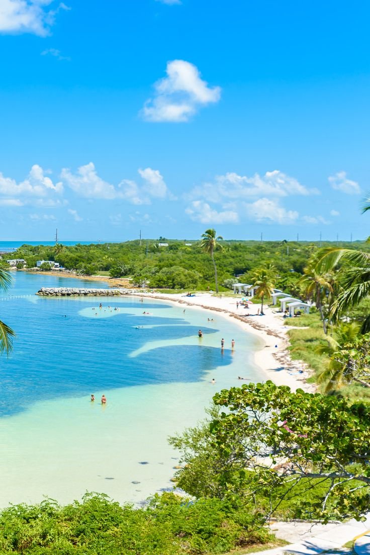 This contains: Beach Camping in the Florida Keys: Bahia Honda State Park