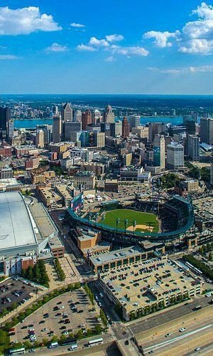 This may contain: an aerial view of a baseball stadium in the city