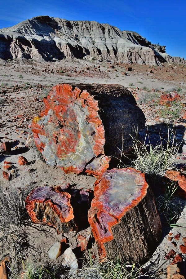 This may contain: some very big rocks in the middle of nowhere