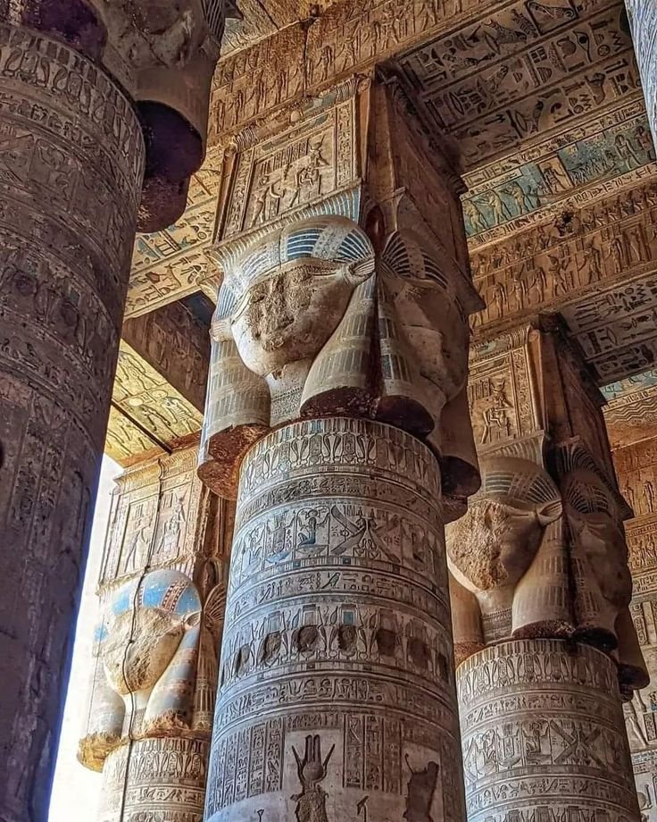 This may contain: the columns in the temple are decorated with egyptian designs