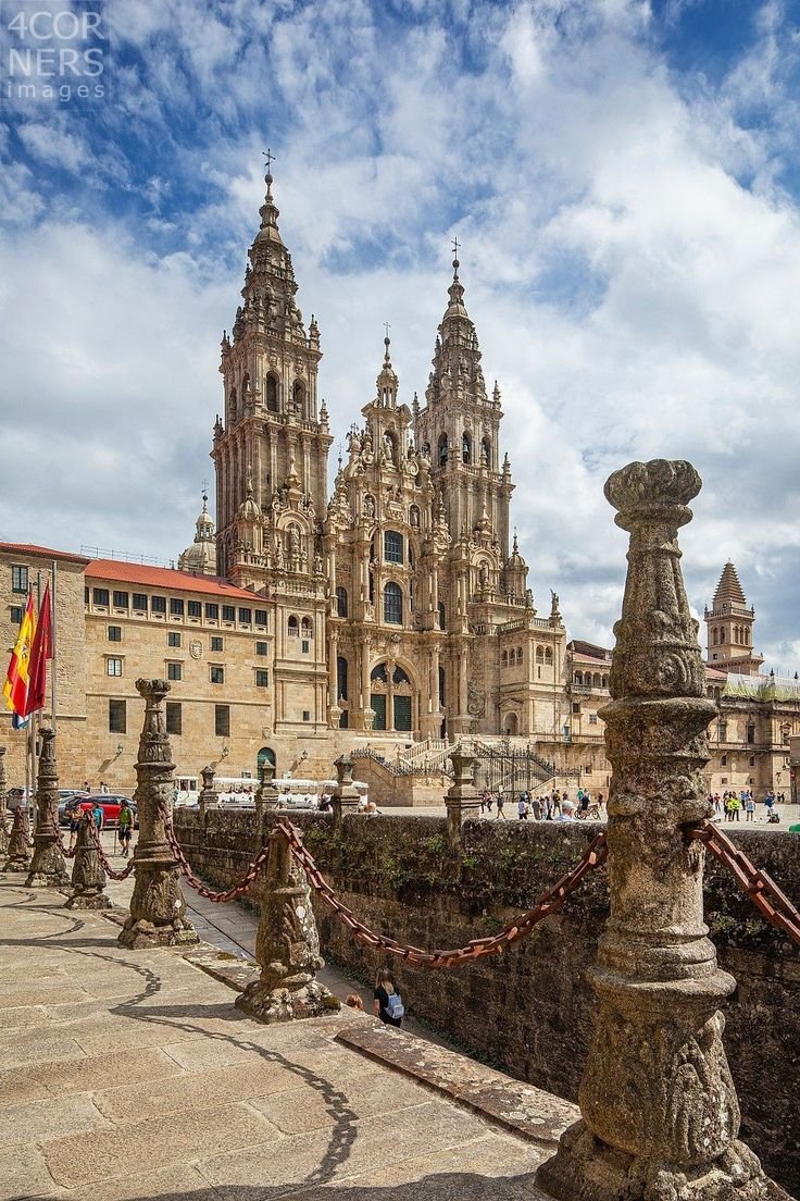 This may contain: an old building with many spires in front of it