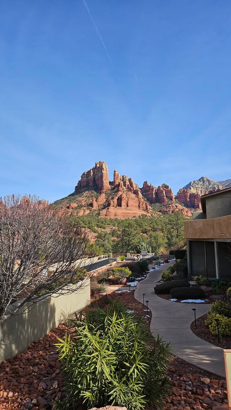 This may contain: a view of the red rocks and mountains in sedona, arizona