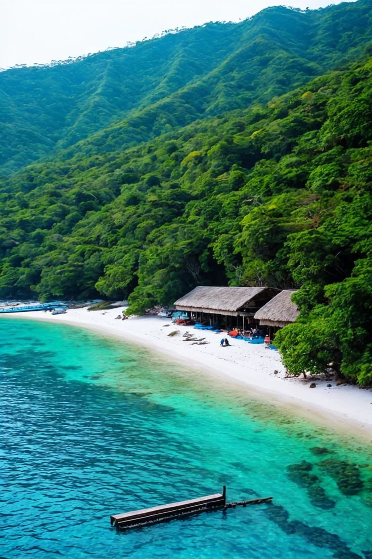 This contains: Redang Island 2025: Pristine coral reefs, sea turtle encounters, and breathtaking beaches. Experience the magic of this Malaysian paradise. #Redang #Travel #BeachLife #EcoTravel
