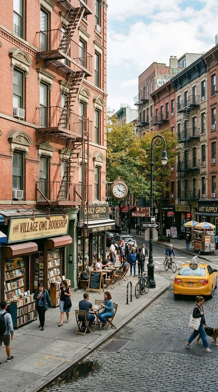 This may contain: people are walking down the street in front of buildings