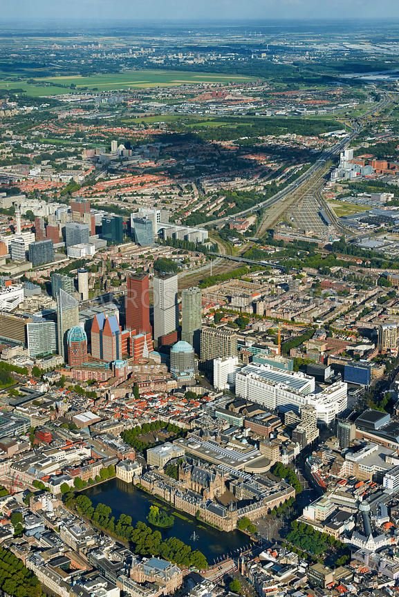 This may contain: an aerial view of a city with lots of tall buildings