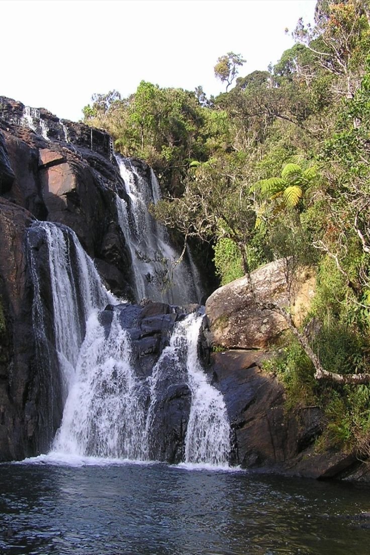This may contain: there is a waterfall in the middle of the water