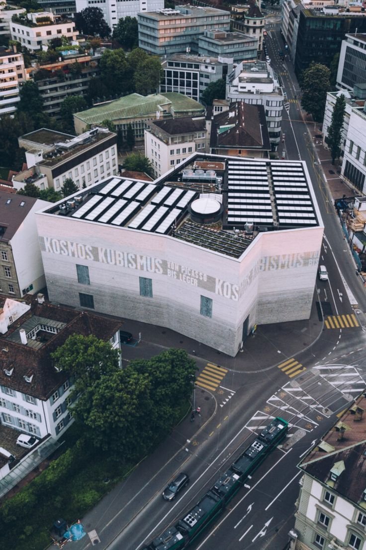 This may contain: an aerial view of a large building in the city