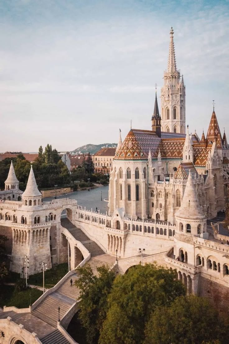 This may contain: an aerial view of a castle with many spires