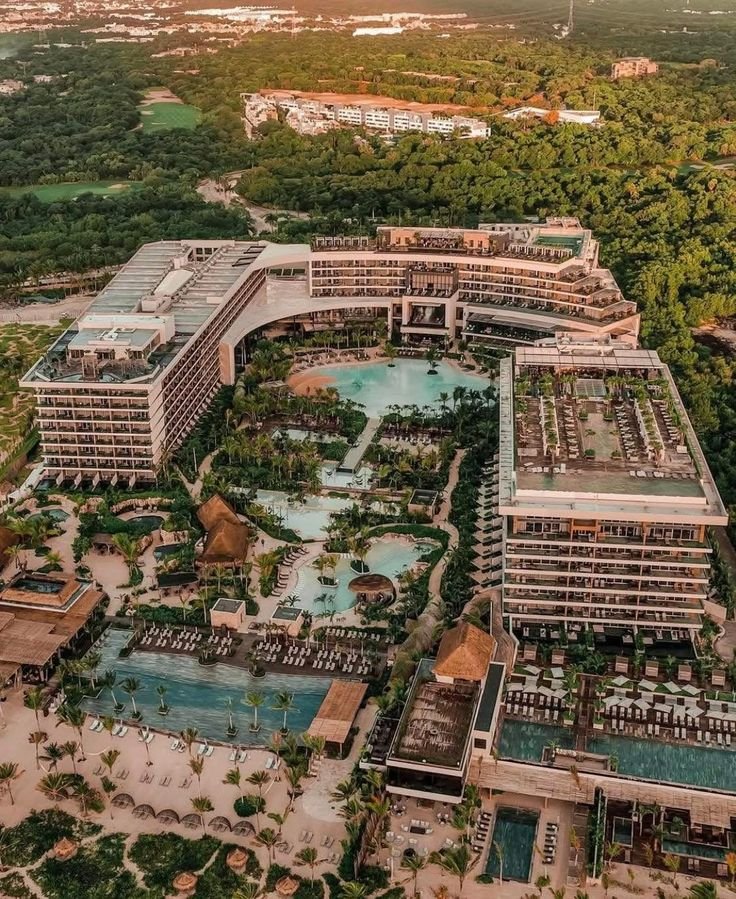 This may contain: an aerial view of the resort and surrounding area
