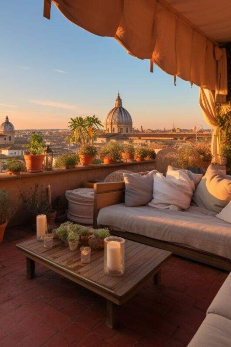 This may contain: an outdoor living area with couches, tables and potted plants on the roof