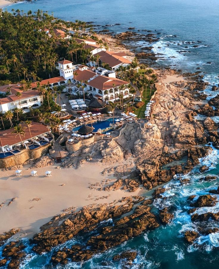 This may contain: an aerial view of the beach and resort