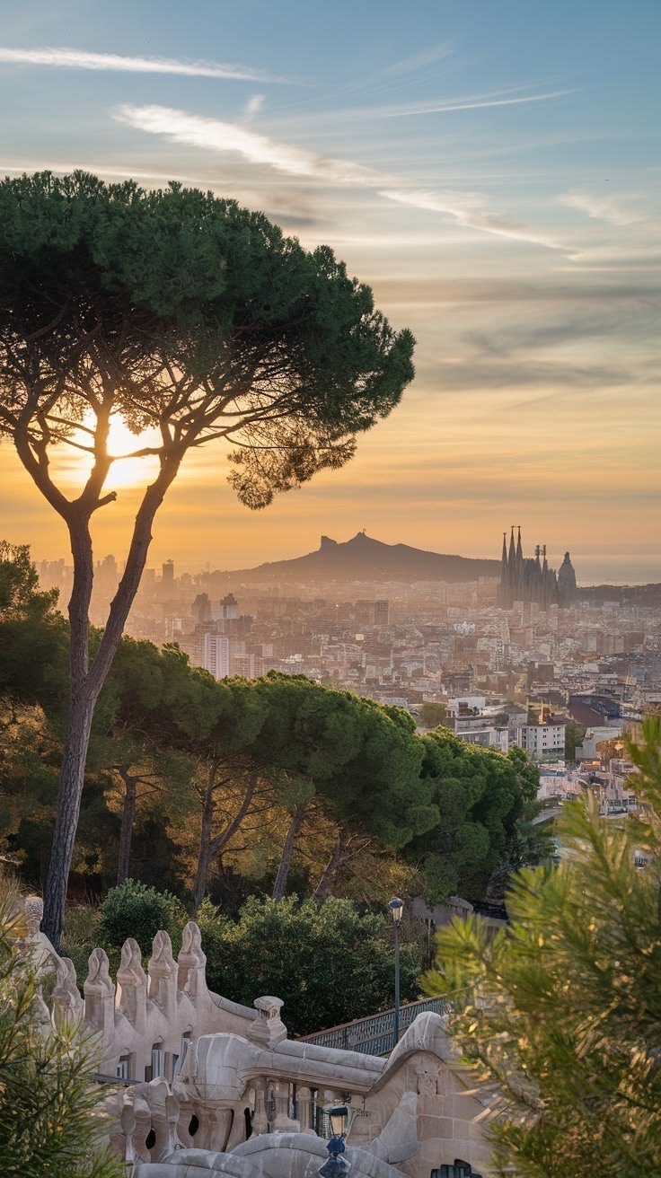 This may contain: the sun is setting over barcelona, spain as seen from parc de cibele