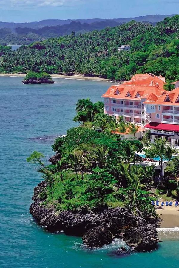 This may contain: an aerial view of the resort and beach