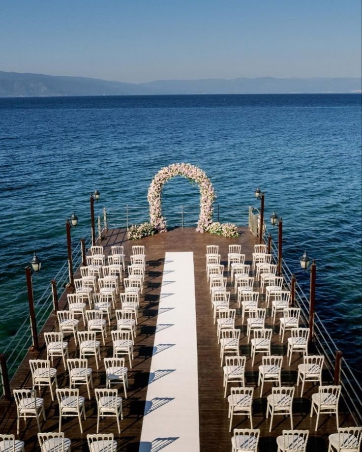 This contains: Destination wedding on the coast of Turkey 
Set on the water at the Montania special class hotel on the pier