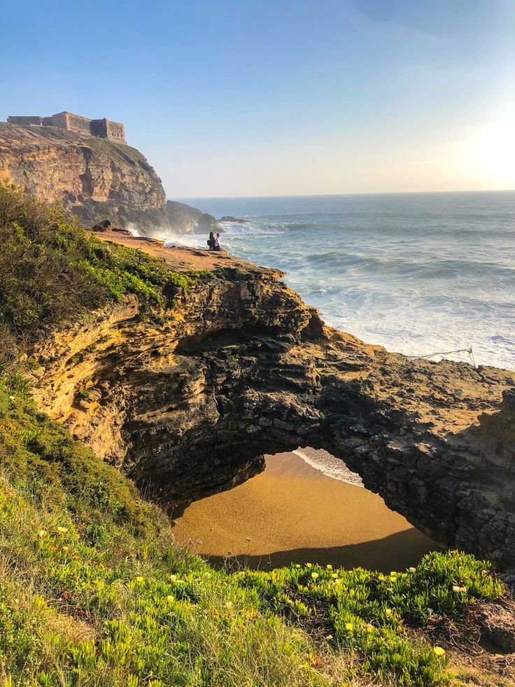 This contains: Nazare Portugal travel Europe coast line summer vacation getaway travel tips surf location waves