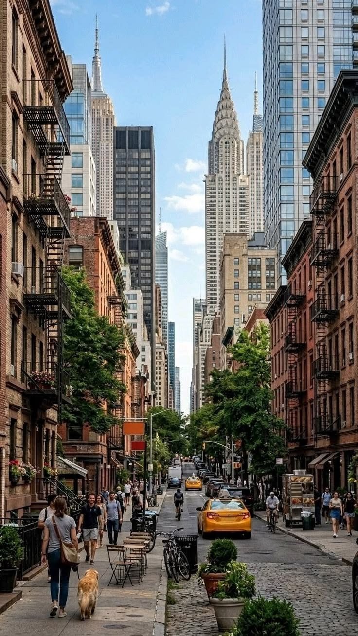 This may contain: people are walking down the street in new york city, with skyscrapers in the background