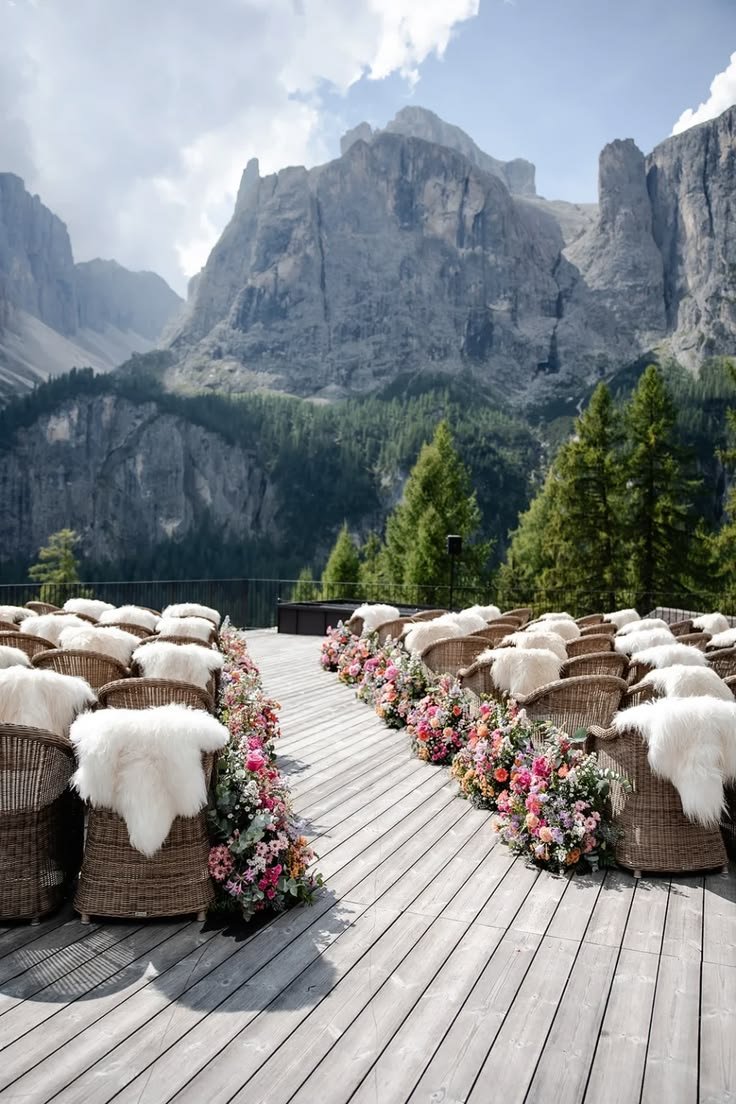 This may contain: there are many baskets on the deck with flowers and sheep's heads in them