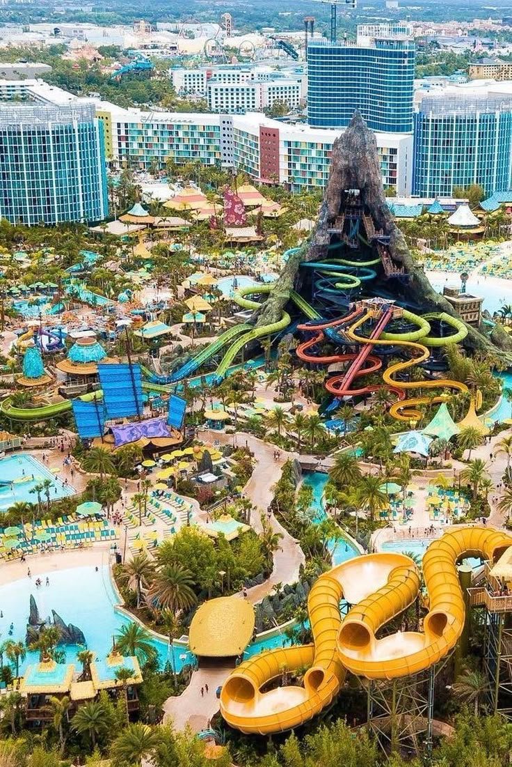 This may contain: an aerial view of the water park with slides and waterslides in front of it