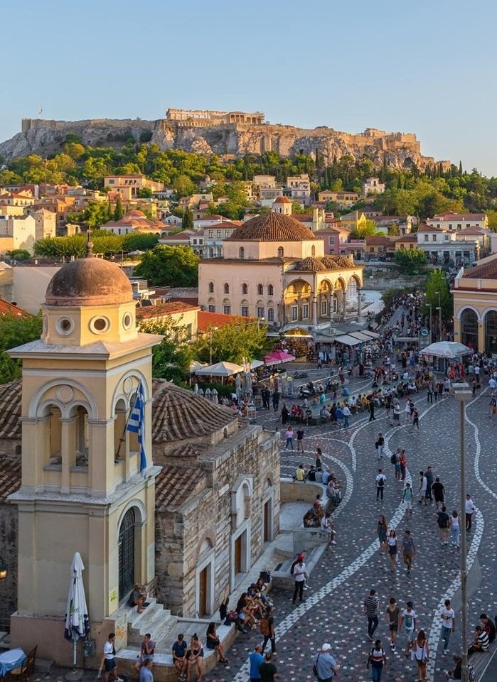 This may contain: an aerial view of the city with people walking around