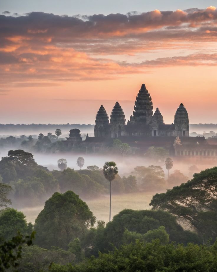 This may contain: the sun is setting over an ancient temple in angna, indonesia's southeast region