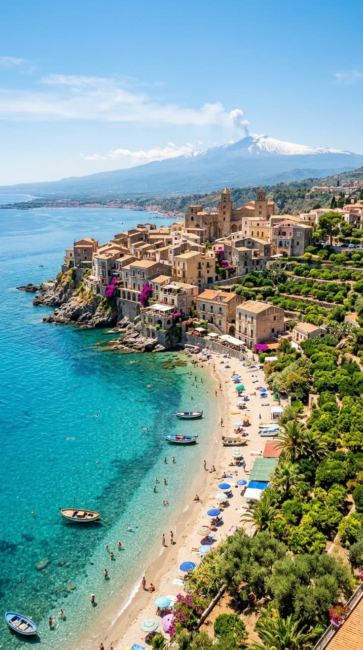 This may contain: an aerial view of a beach with boats in the water