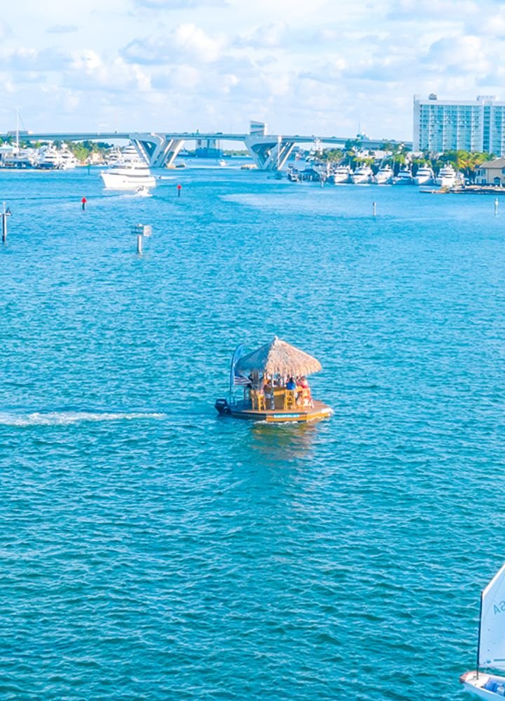 This may contain: there is a small boat in the middle of the water
