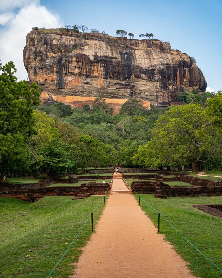 This may contain: a path leading to the top of a mountain