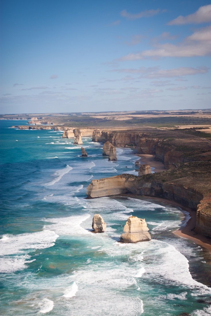 This may contain: the great ocean road is one of australia's most scenic drives